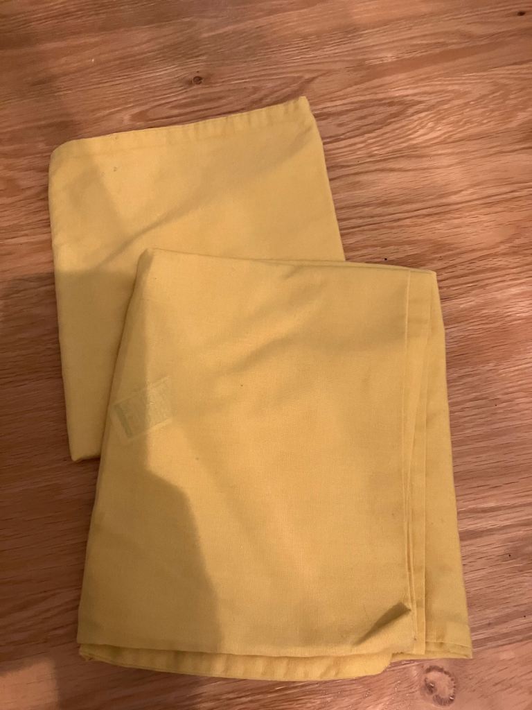 Two yellow pillowcases 