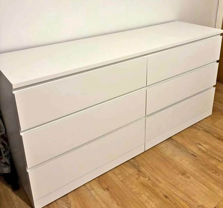 A IKEA LARGE and spacious chest of drawers featuring six individual drawers.