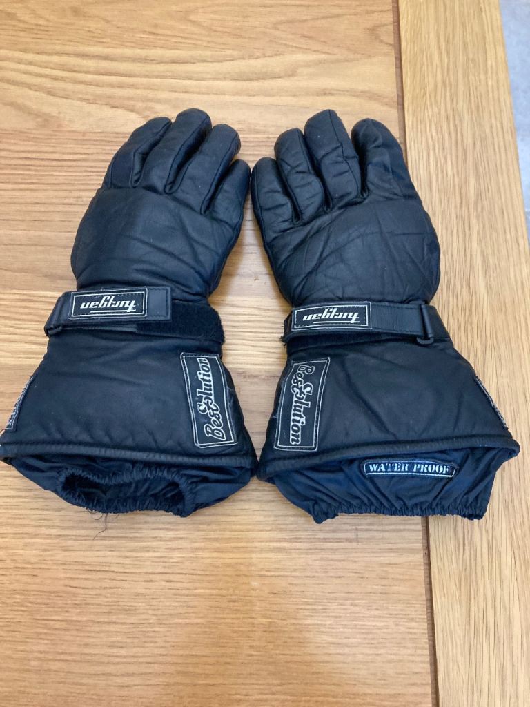 Pair of black leather motorcycle leather gauntlets