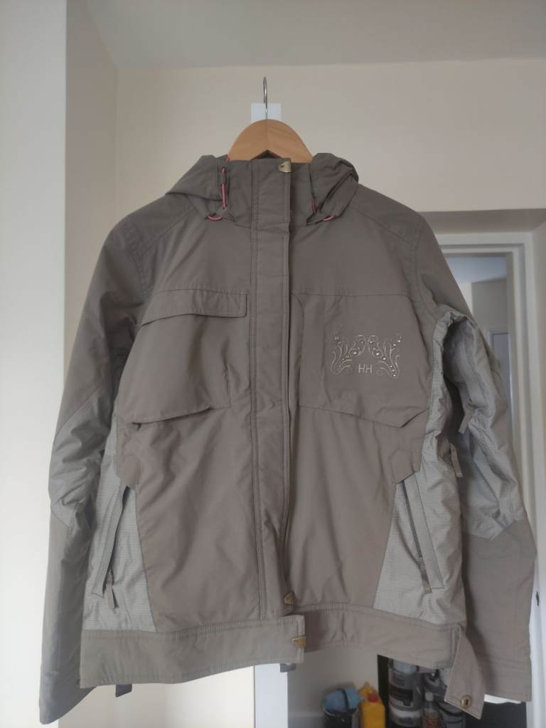 image for A new ladies' Helly Hansen winter ski jacket, light brown, adjustable hood, size M 