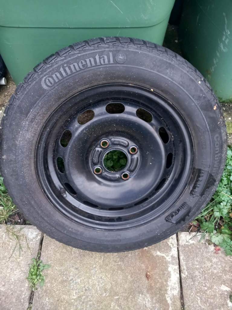 Excellent tread 4 holed wheel. 185/60-14-821 Radial Tubeless