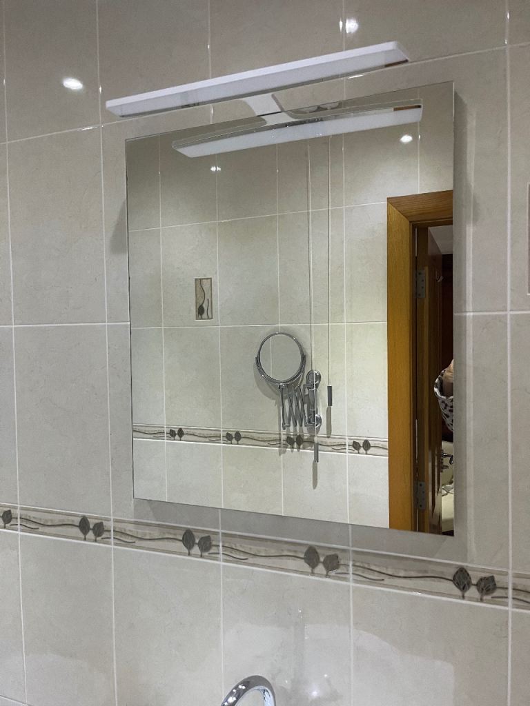 Bathroom mirror with sensor light