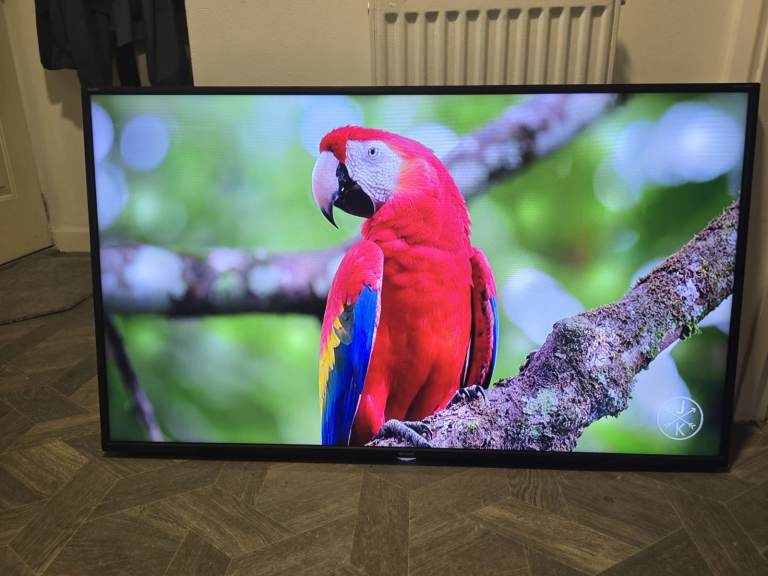 Sharp 49 Inch Smart TV with remote. bright spots on screen.