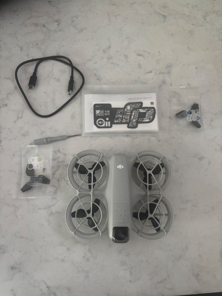 DJI Neo Drone Bundle – Like New, Used Once, Includes Case & Extras