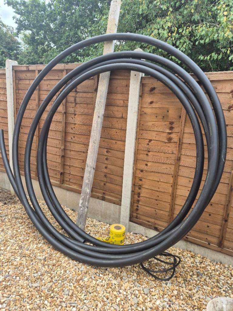 Black Plastic Pipe Coil – Good Condition