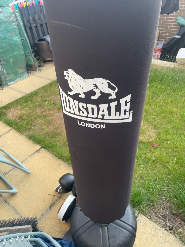 Freestanding punching bags, gloves and pads