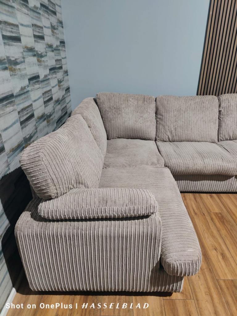 Large beige DFS Corner Sofa Bed  with footstool + free delivery