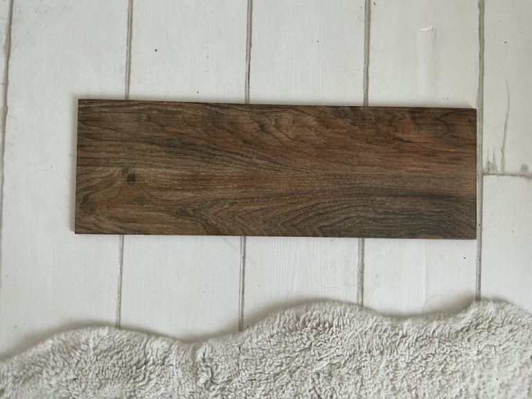 14 Dark wood effect porcelain tiles