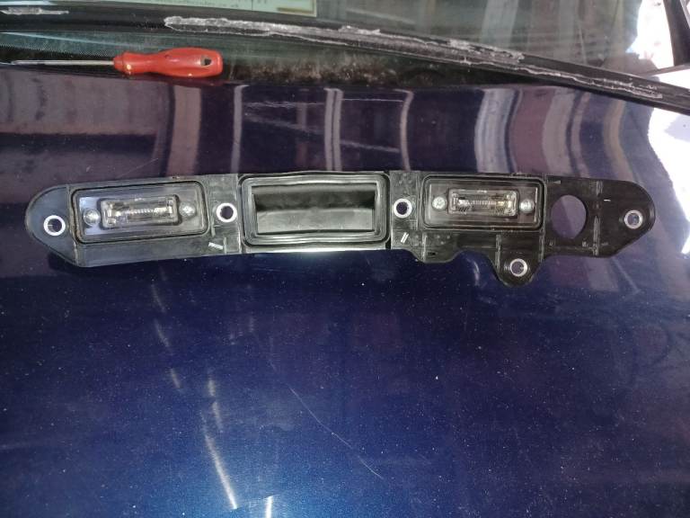 Fairly new tailgate handle with licence plate lights for sale
