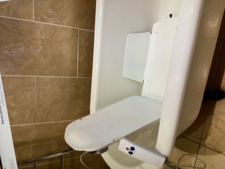 Reclining bath lift