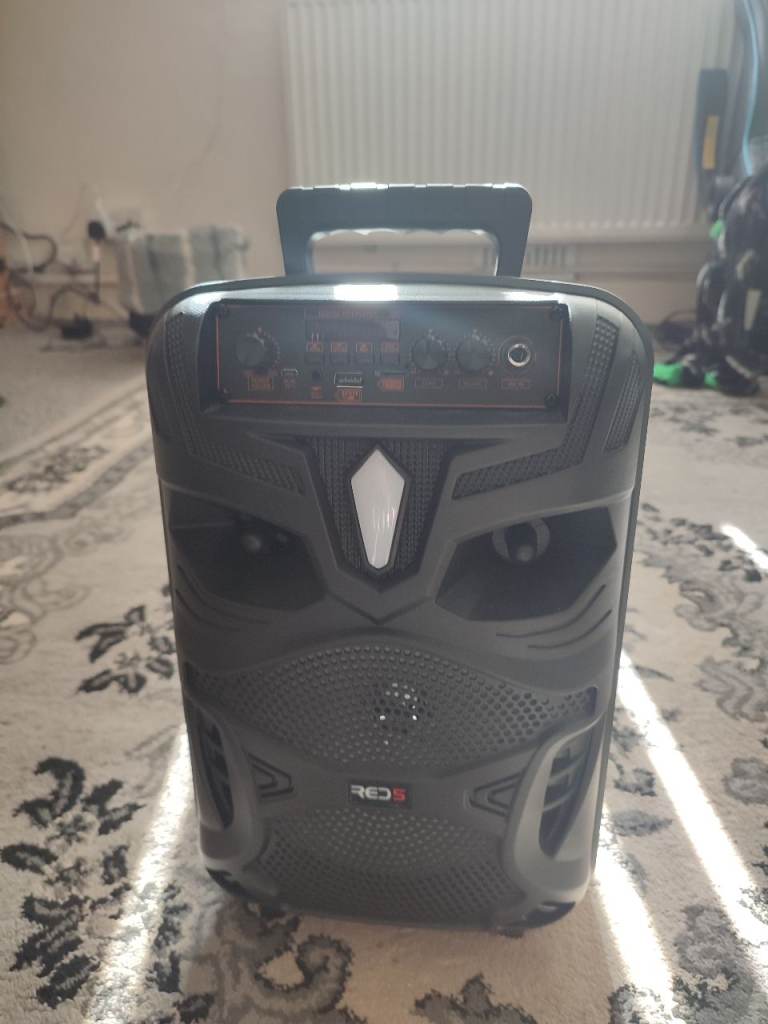 RED5 wireless karaoke speaker with Bluetooth and LED lights.