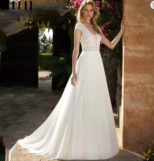 Brand new- Bridal gown V-Neck with lace top