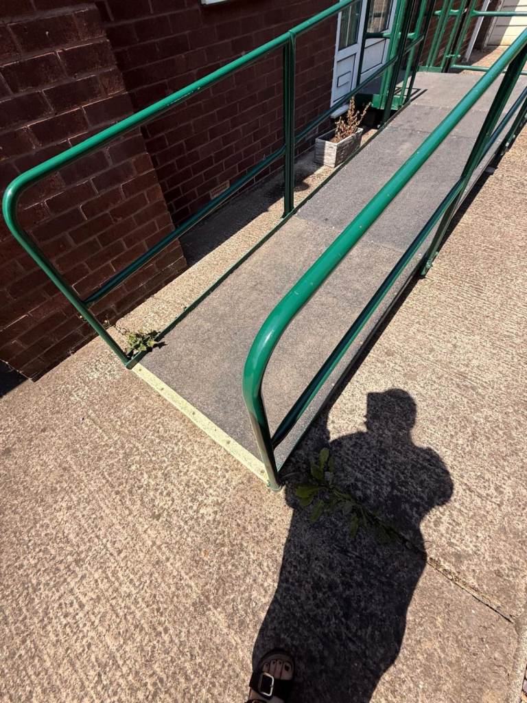 Robust Metal Outdoor Ramp with Handrails – Good Condition