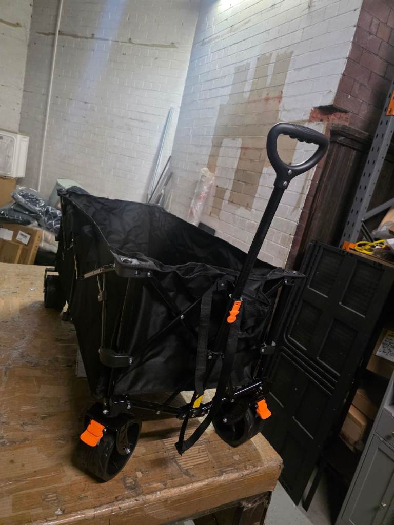 A new large Heavy Duty Black 300L camping wagon it is foldable and comes with its own bag.