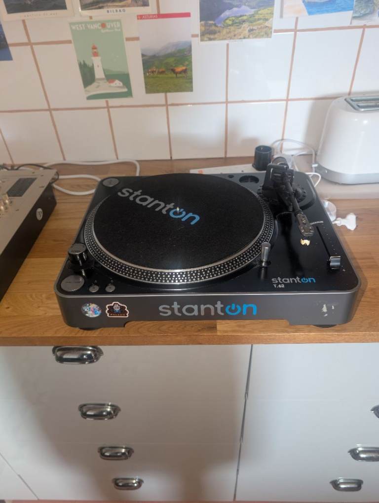 DJ turntable with speakers and mixer