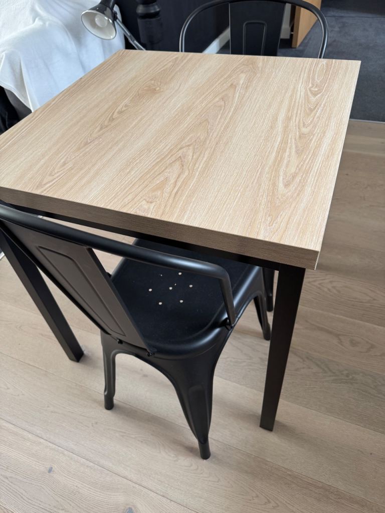 Small Dining Table with Two Black Metal Chairs – Good Condition