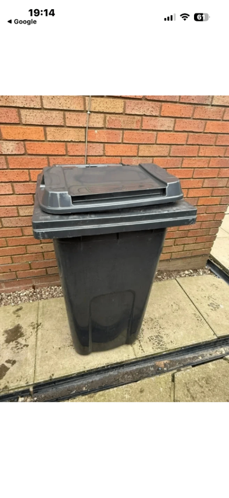 Grey wheelie bin 