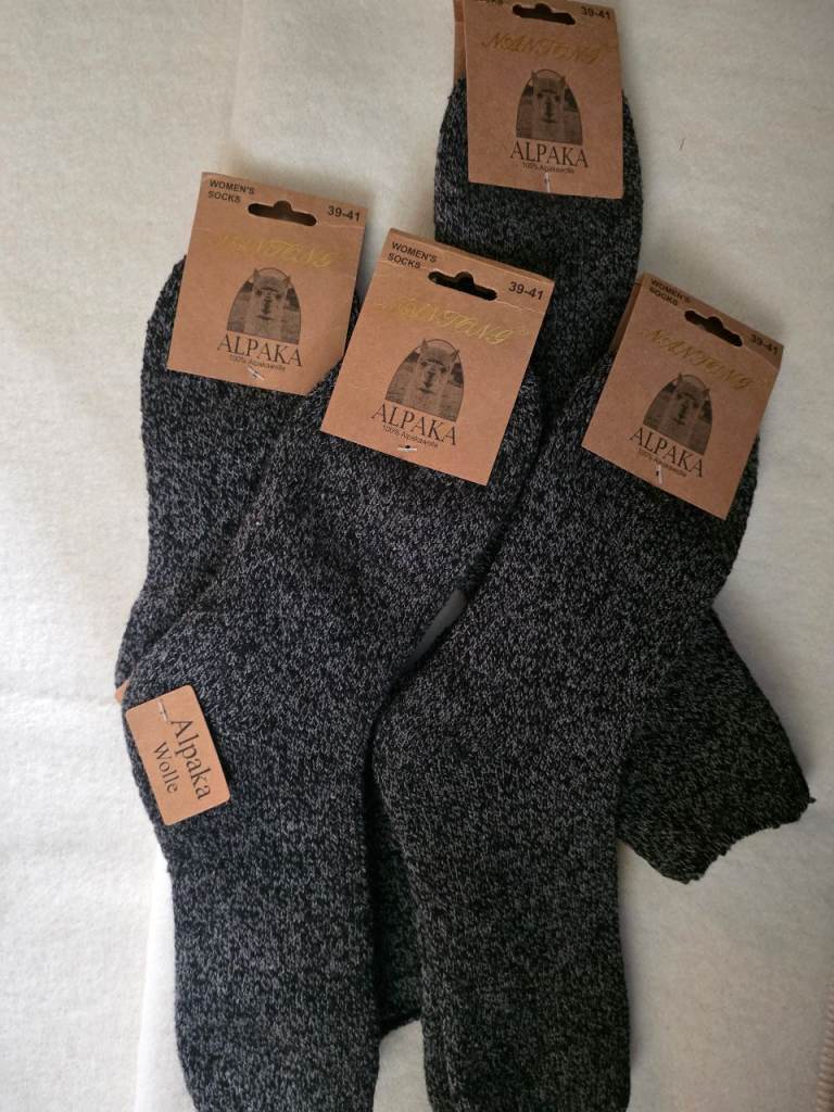 Thick premium alpaca wool socks available in sizes 2 - 11 and a selection of colors  