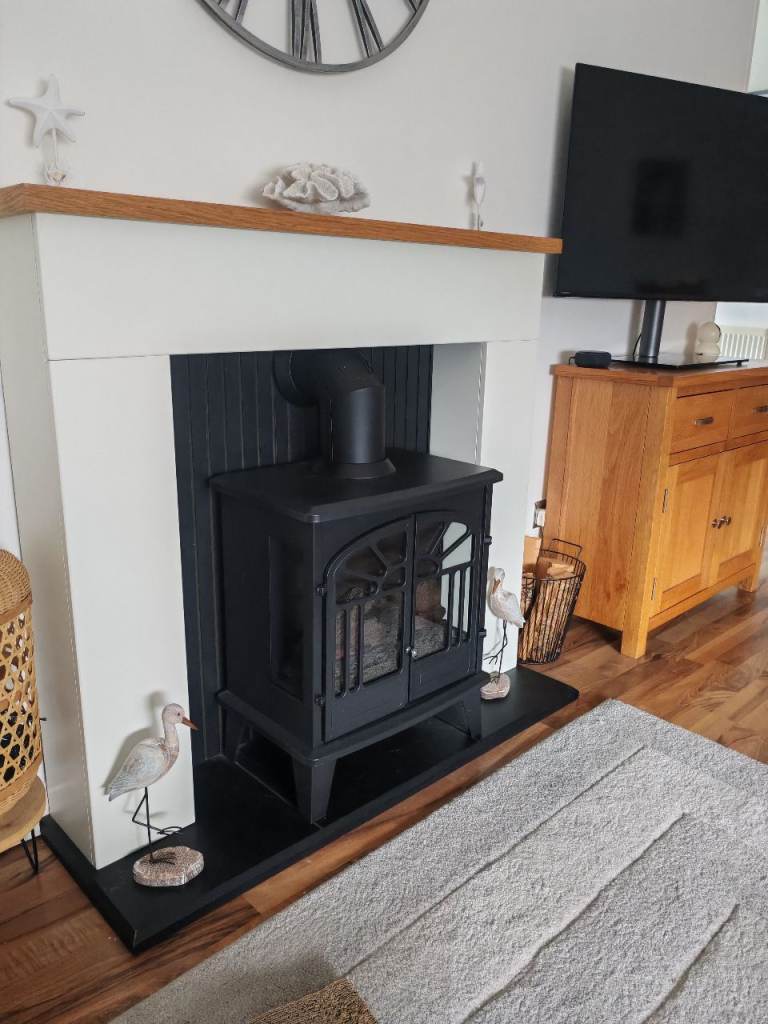 Stylish Black Fireplace with electric Wood Burner – Great Condition