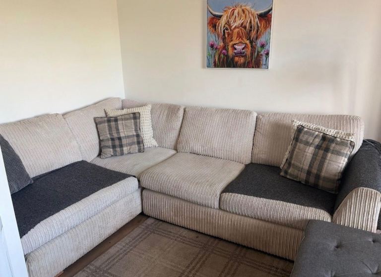 L shaped Cream sofa