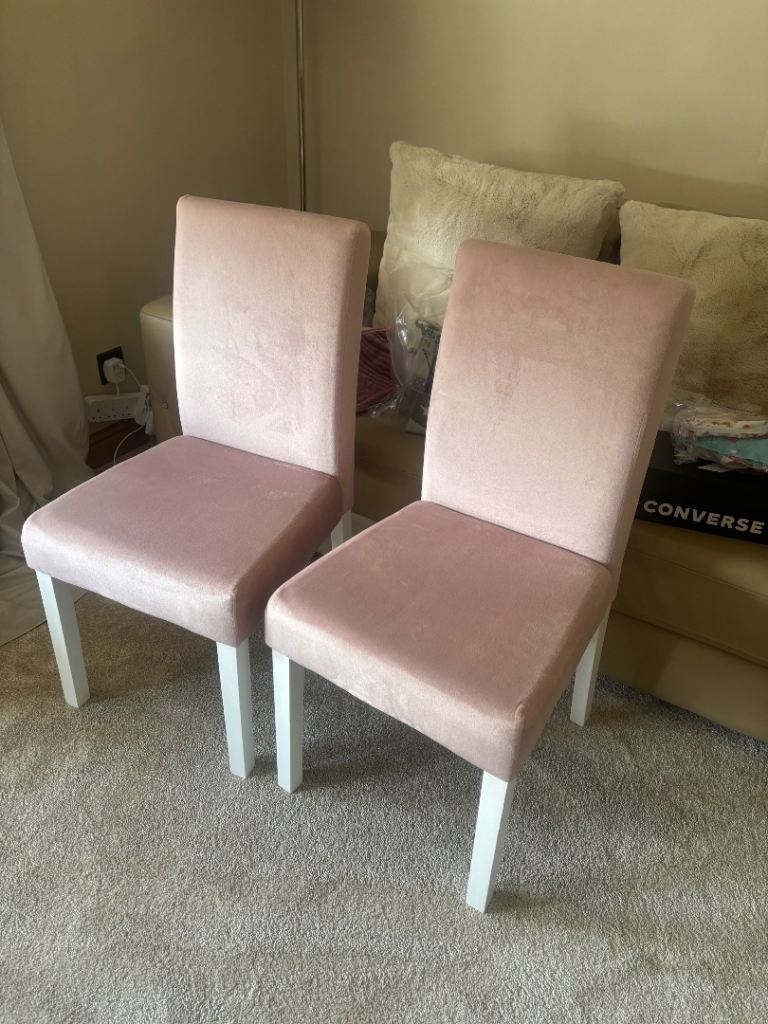 2 pink dining chairs 