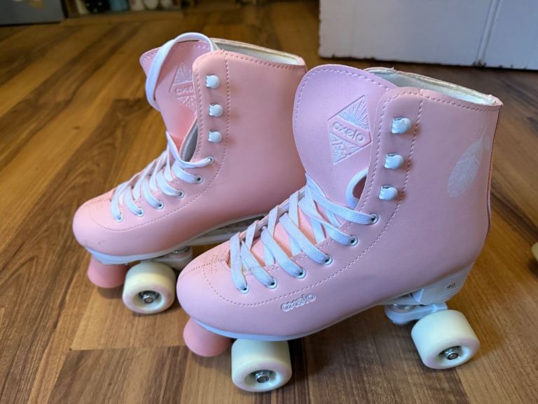 Pink roller skates size 7