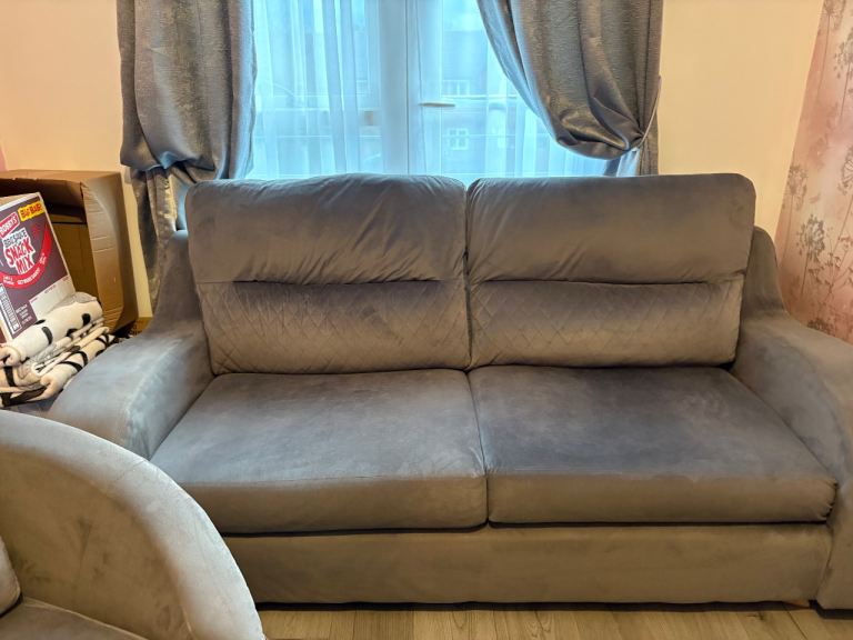 Grey velvet sofa chair and matching pouffee 