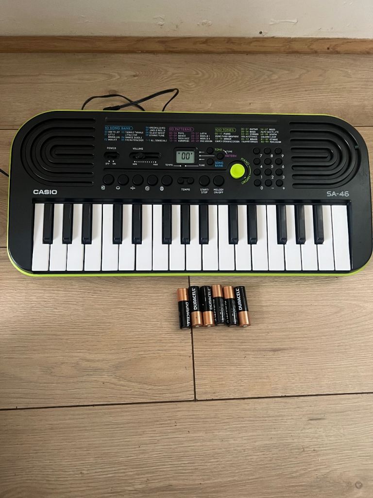 Casio SA-46 Mini Keyboard – Black & Green, Good Condition