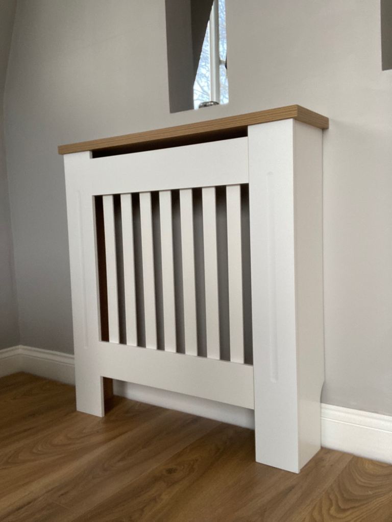 x4 New condition Modern Oak effect radiator covers 