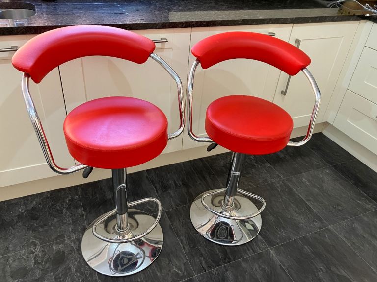 A pair of bar stools from kitchen