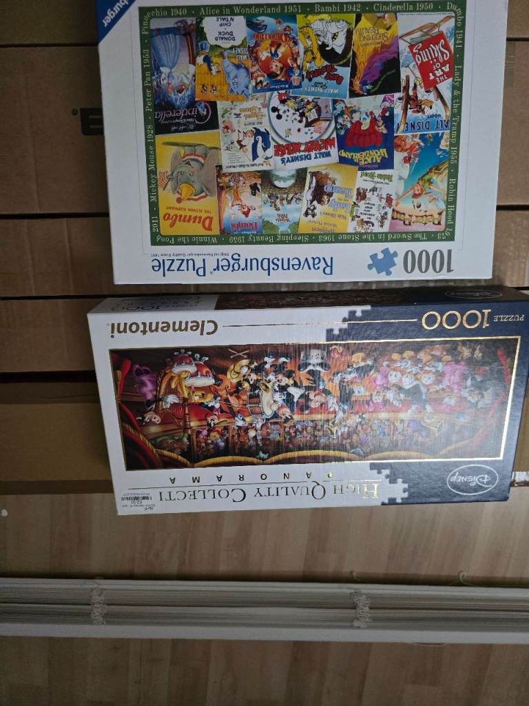 2 disney jigsaw puzzles