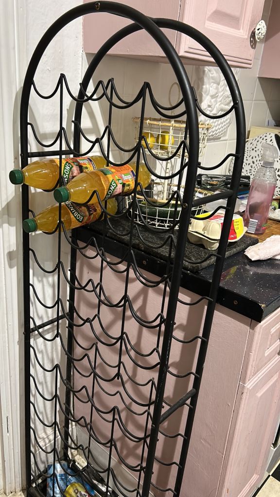 Black Metal Wine Rack – Holds 28 Bottles, Good Condition