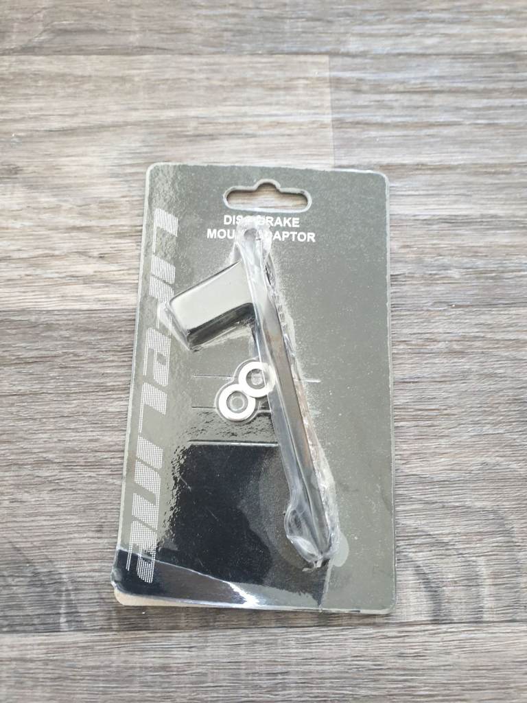 Disc brake adapter to fit 180mm disc rotors. New