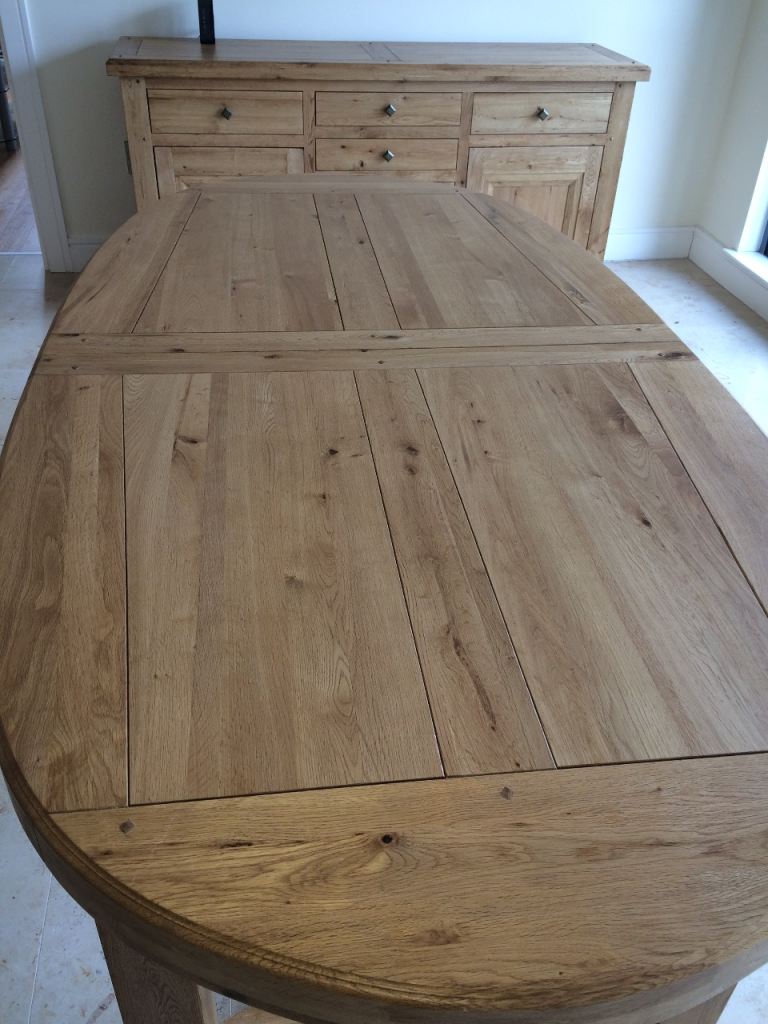 Solid oak dinning table, chairs and sideboard 