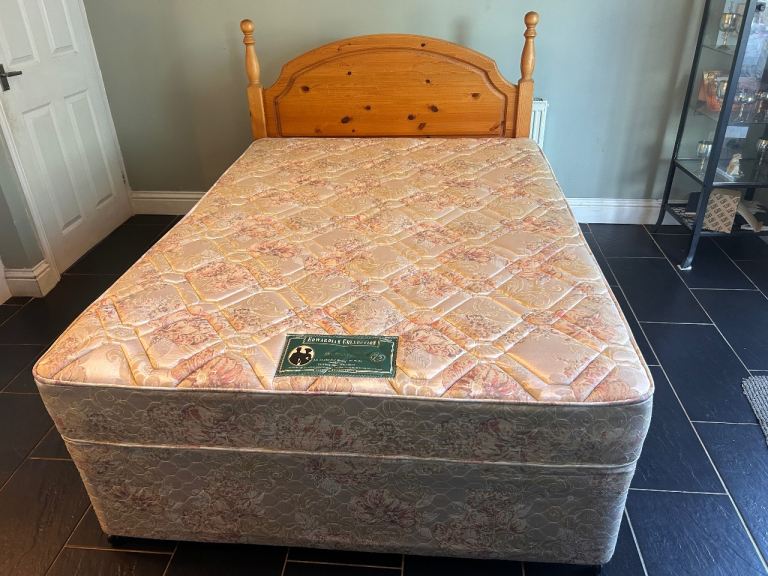 Double bed with floral pattern mattress 