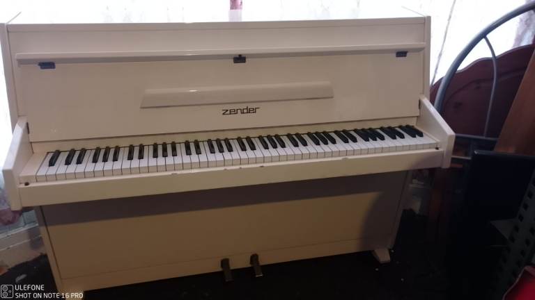 Beautiful ivory colored piano (factory finish)