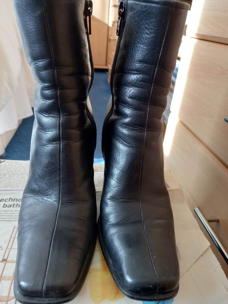 Size 3 Ladies black leather high heeled ankle boots .