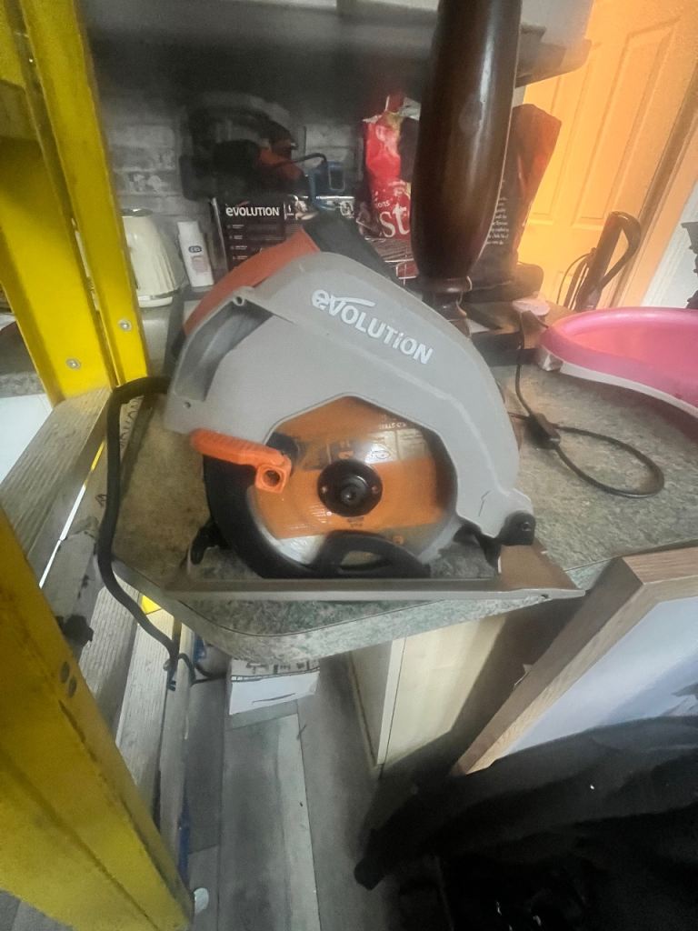Evolution Circular Saw – Good Condition, Grey and Orange