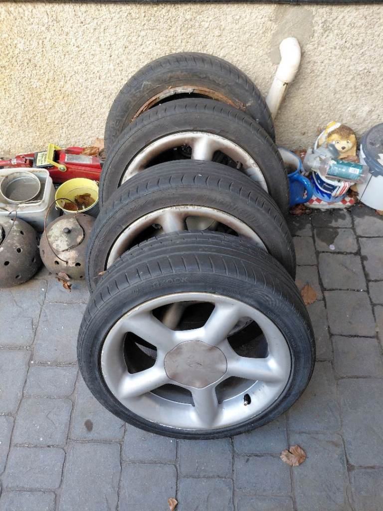 Ford RS five spoke alloys. Scruffy. Tyres are almost mot passable!! All four wheels have kerb rash.