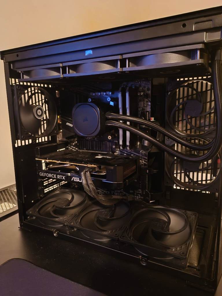gaming pc with 1440p monitor, headset and streaming setup 