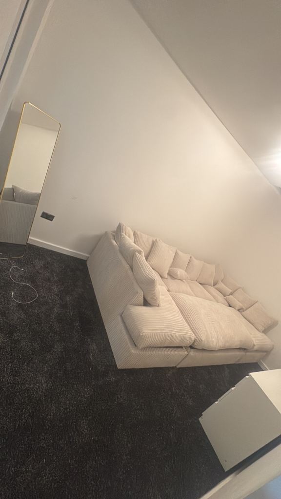 Cream Fabric U-Shaped Sofa Bed - Good Condition