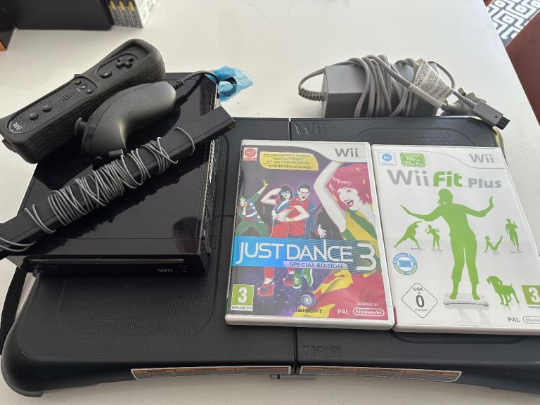 Nintendo Wii Console with Wii Fit Plus and Just Dance 3
