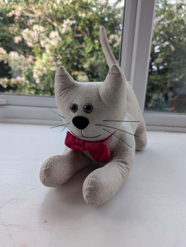 Cute cat doorstop