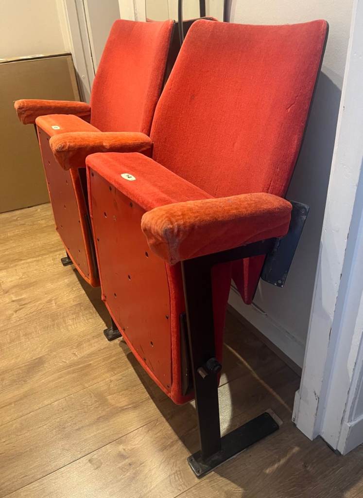 Two old theatre chairs from old London theatre