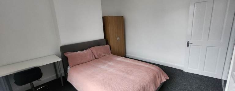 Shared Bedroom Available at S2 for Long-term Rent