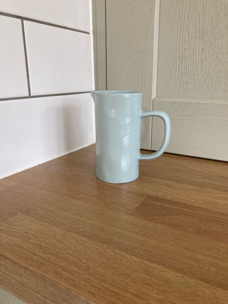 Sweet little blue milk/cream jug Poole pottery 