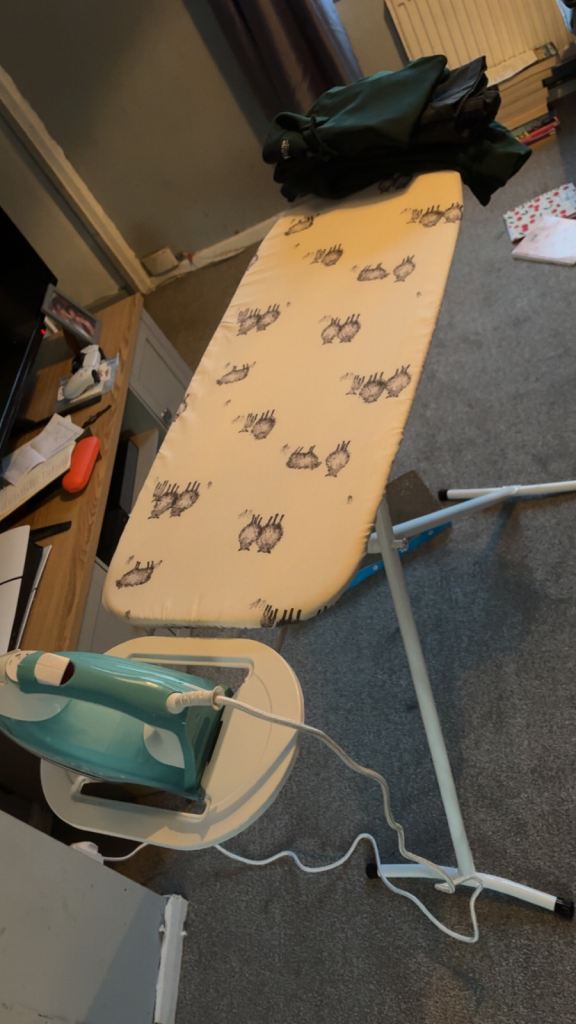 Iron and ironing board. 
