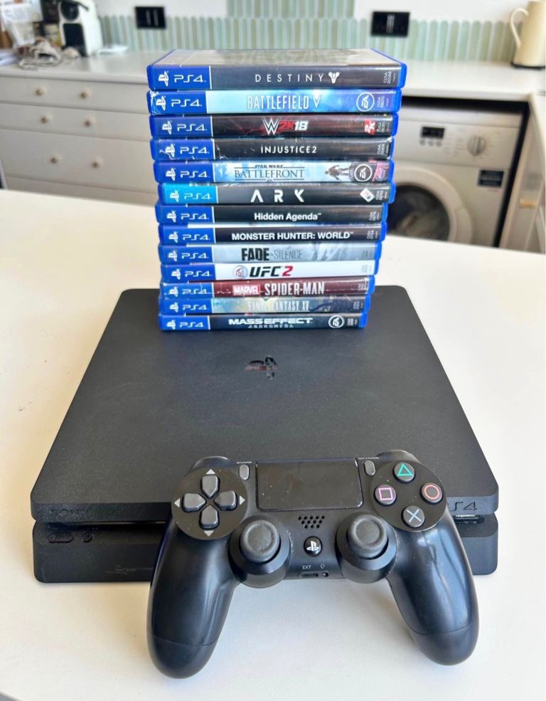 Sony PlayStation 4 with Controller & 10 Games – Good Condition