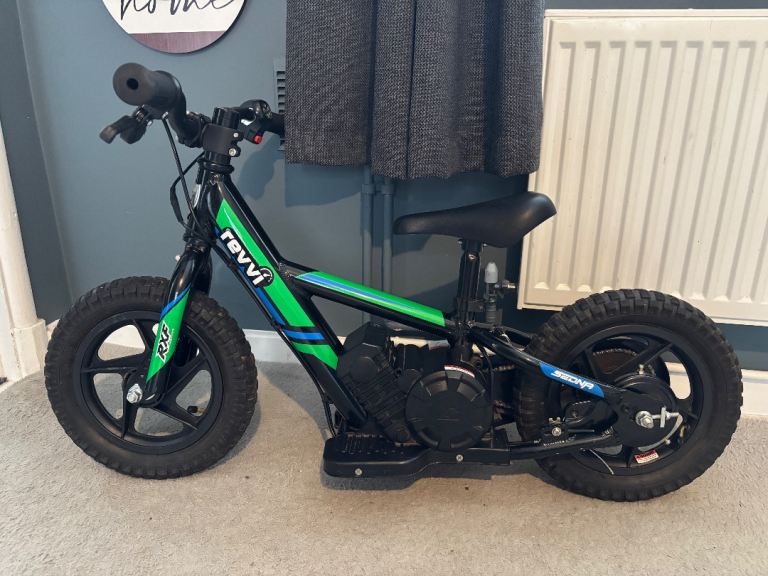 image for Revvi electric balance bike & helmet