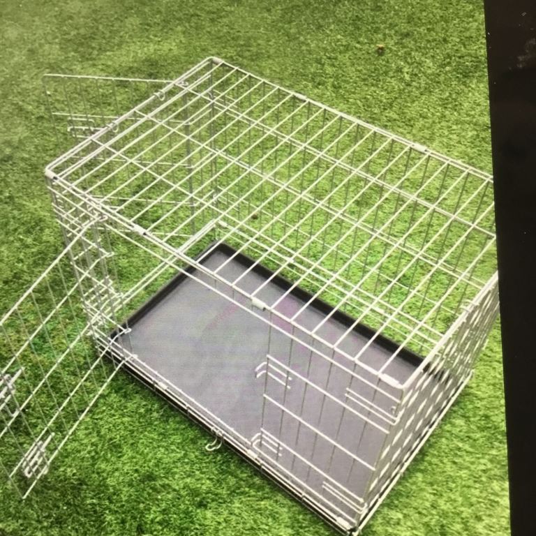 “Pets at Home” pet cage for either a medium size dog or a cat.